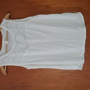 White sleeveless blouse